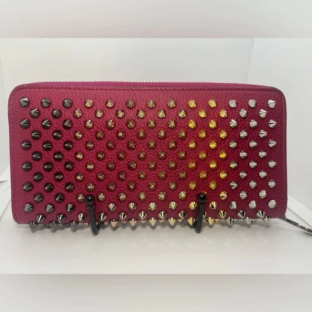 Christian Louboutin Zip Around Panetone Studded wallet in Wine Color, Leather